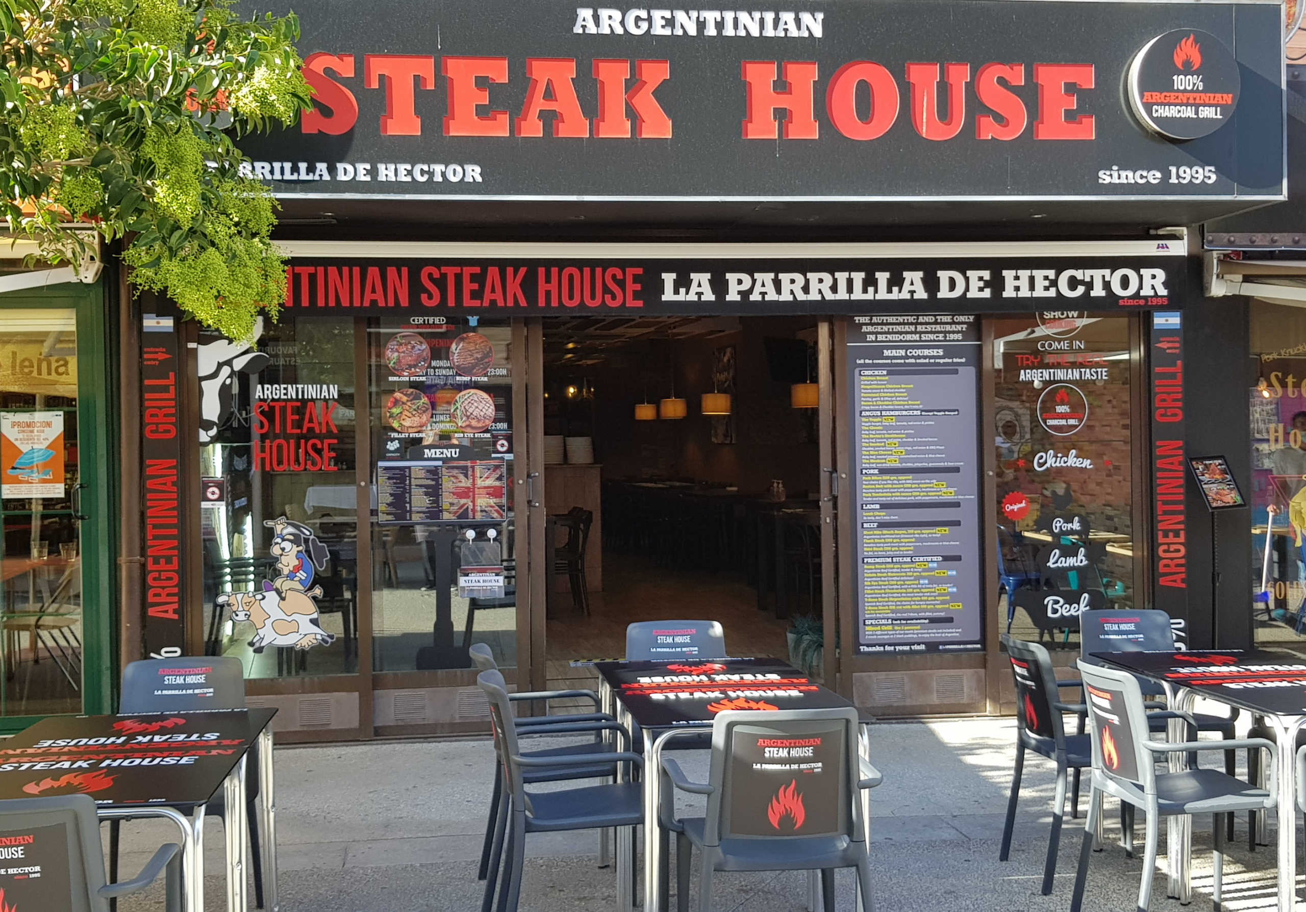 Argentine grill with real fire and charcoal embers in Benidorm